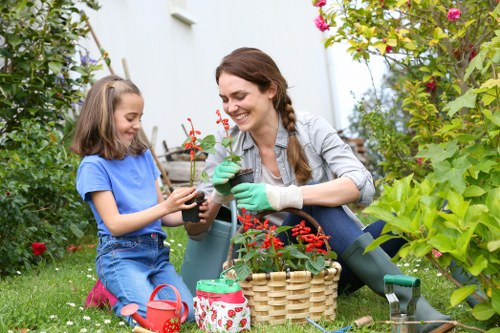 Gardening service team preparing a customer property for scheduled work