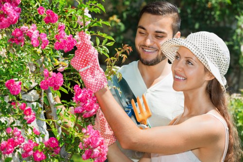 Professional gardeners carrying out agreed outdoor maintenance work
